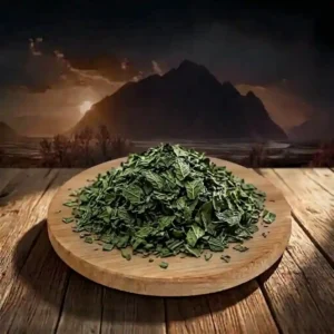 Spearmint green tea from gilgit on the table with mountains and sunset in the background